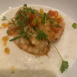 a plate of food with shrimp and vegetables