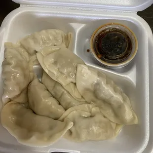 dumplings in a styrofoam container