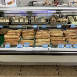 Here's a pic of the subs and also the regular style sandwiches . They also have bagels , sandwiches made with rye bread