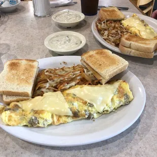 Omelet breakfast with a side of sausage gravy