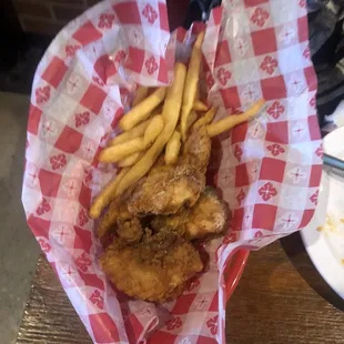 Kids chicken and fries.