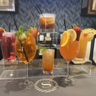 a variety of cocktails on a table