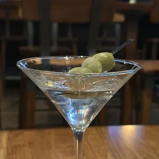 a martini with olives in it