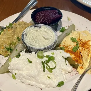Dip app - beet, hummus, garlic, eggplant, and Tzatziki served with pita bread and chips
