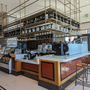 a coffee shop with a long counter