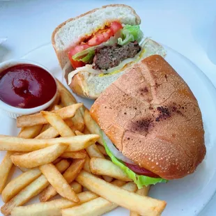 a sandwich and fries on a plate