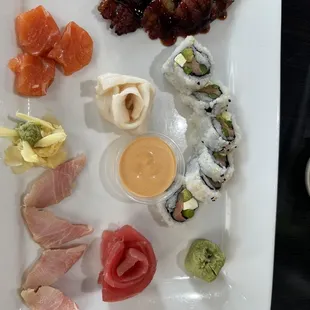 Sashimi platter and a roll.