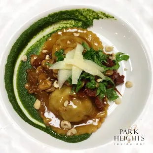 Special ....Duck confit ravioli, sun dried tomatoes, butter beans, Native Son arugula hazelnut pesto.
