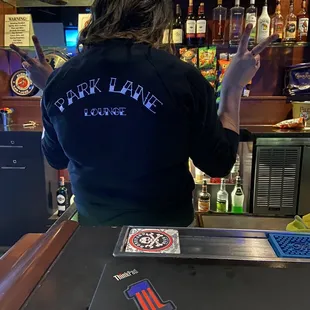 a bartender at the bar