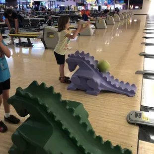 Dinosaur bowling ramps