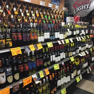 a large selection of wine on display