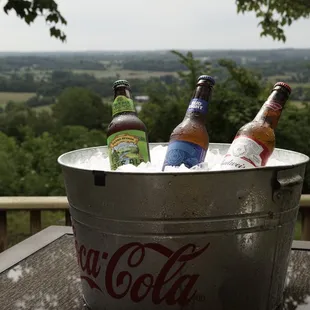 A seat and a cold drink with a view.
