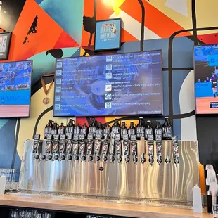 a bar with beer taps