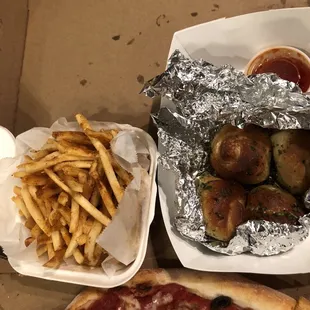 Cold fries, cold garlic knots and parco pizza with sausage.
