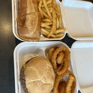 a hamburger and onion rings