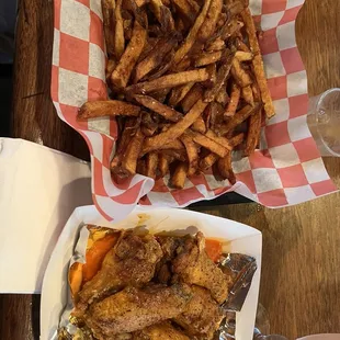 5 wings $8.50 or 10 wings $16  Regular Fries $7  Ranch .50-$1