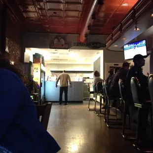 a man standing at the counter