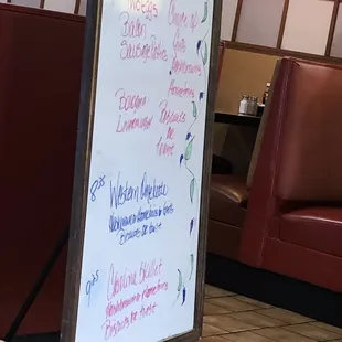 a menu on a white board