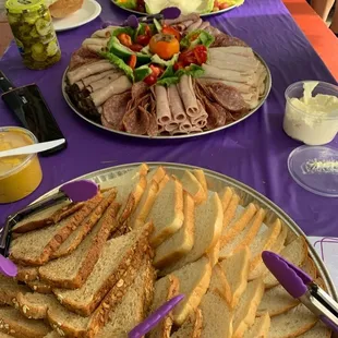 Purple Party! Bread, meat, cheese tray. Served with a side of mayo, mustard, lettuce, tomatoes, and pickles.