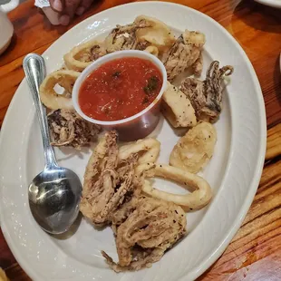 This was supposed to be an order of calamari.  Apparently, mgt cut the portion size but not the price. Disappointed as a LONG TIME customer