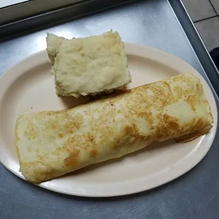 Breakfast burrito with homemade biscuit