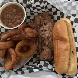 Pulled pork with baked beans, onion rings, bread. Eh.