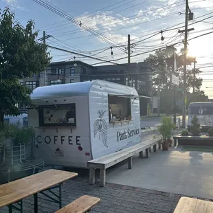 a food truck parked on the side of the road