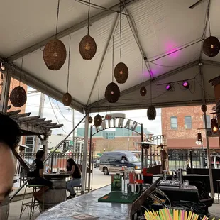 a woman sitting at a bar