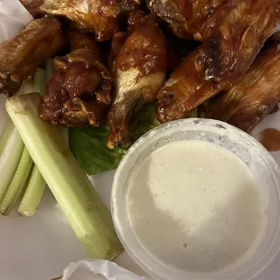 BBQ Chicken Wings with Celery Sticks and Blue Cheese Dressing