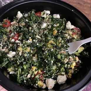 Street Corn Salad Seasonal corn, kale, delicious basil and tomatoes, feta cheese, and citrus dressing.