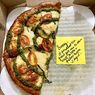 My small "modern margherita" pizza after I destroyed half of it...