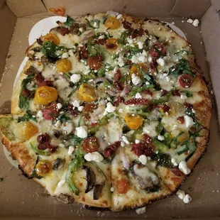 Large veggie on thin crust.