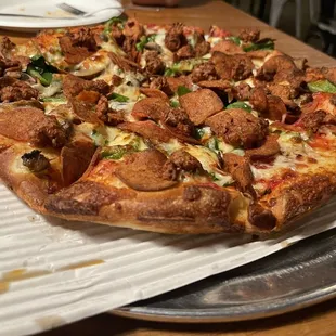 Pizza with plant based sausage and pepperoni