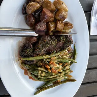 Elk Tenderloin with potatoes and beans in sriracha cream sauce