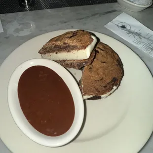 Ice cream sandwich with chocolate dipping sauce