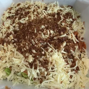 a dish with cheese and meat