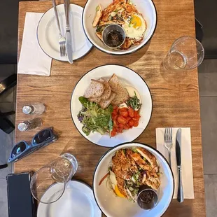 three plates of food on a table