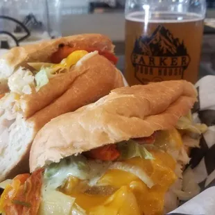 a chicken sandwich and a beer