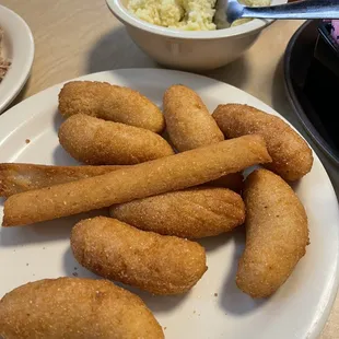 Corn sticks and hush puppies (come with every dinner)