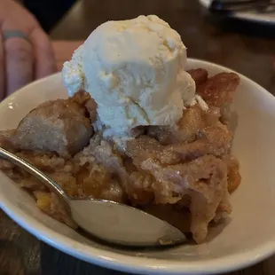 Amazing peach bourbon bread pudding with ice cream