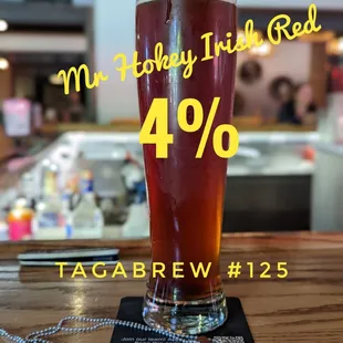 a glass of beer on a table