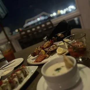 New England Clam Chowder, crunch roll and a seafood mix plate