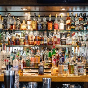 a bar filled with liquor bottles