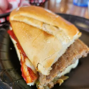 Pizza Steak with cheese, pizza sauce and pickle. Great sauce.