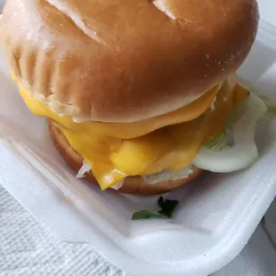 Double cheeseburger extra cheese for carryout.