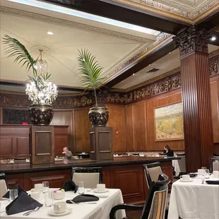 a dining room with tables and chairs