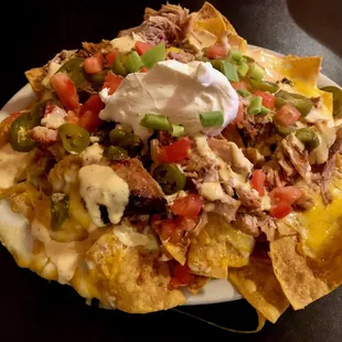 Pulled pork nachos.  Enough for a meal for two!