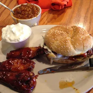 Smokehouse burger with a few bbq wings