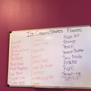 a whiteboard with a list of ice creams