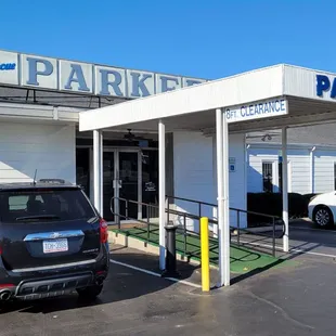 a parking lot with cars parked in it